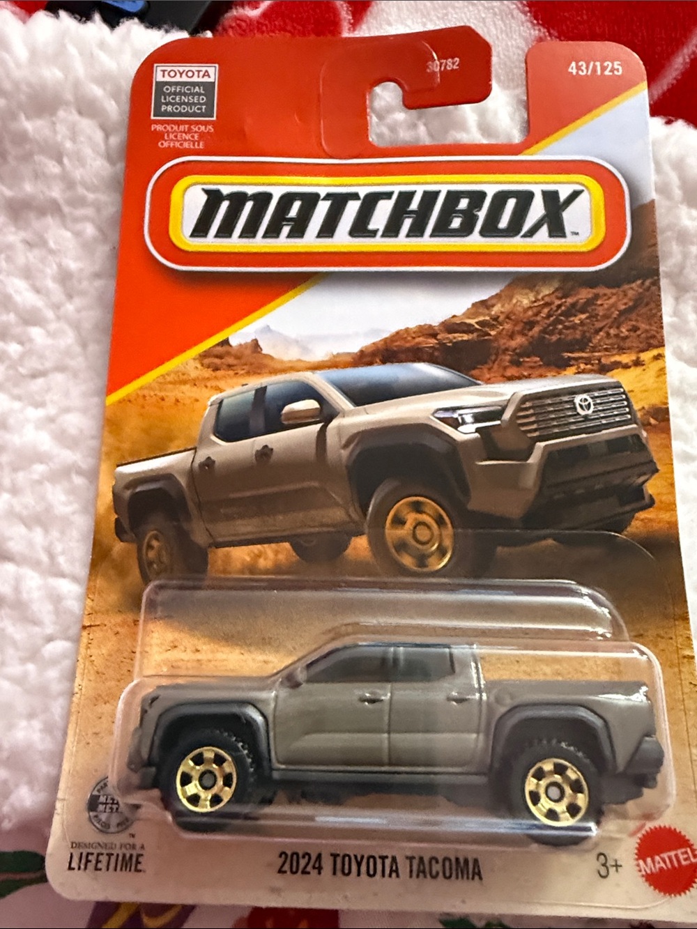 Match 2024 Toyota Tacoma Toy Truck - Gray with Gold Wheels